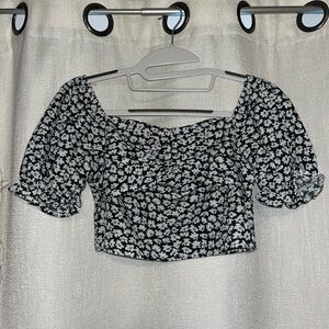 Very pretty cropped blouse. Emerald green, white, & dots of purple in flowers.